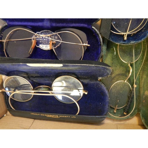 42 - 8 pairs of vintage spectacles in cases, possibly some gold but none marked.