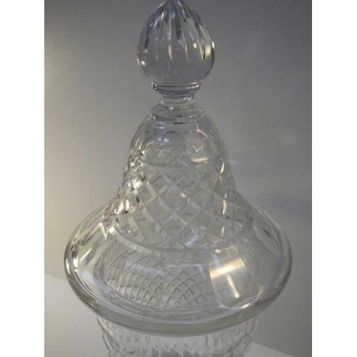 43 - A mid 20th century cut glass lidded jar, approximately 15'' tall, in good condition.