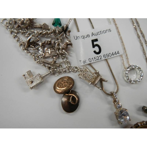 5 - A mixed lot of jewellery including silver necklaces, dress rings, earrings etc.,