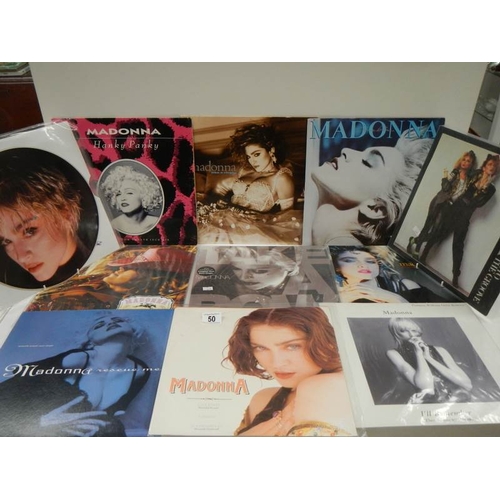 50 - 11 Madonna 12 inch records - 3 in near mint condition, 7 in good condition with a couple of minor sc... 