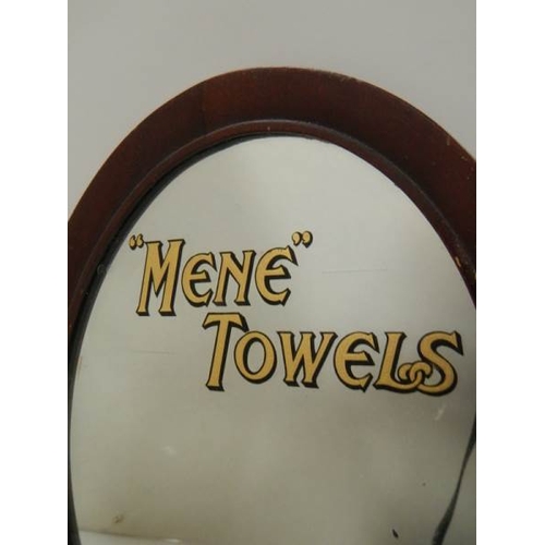 54 - An old mahogany framed advertising mirror, 'MENE TOWELS' printed in gold