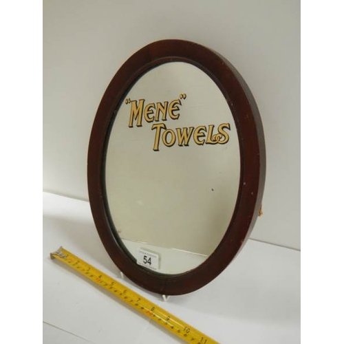 54 - An old mahogany framed advertising mirror, 'MENE TOWELS' printed in gold