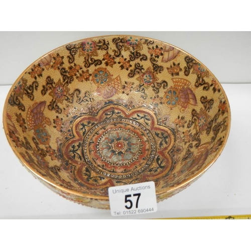 57 - A mid to late 20th century hand painted bowl, 9.5'' diameter.