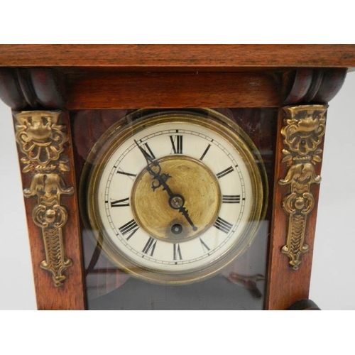 63 - A late Victorian mantel clock in working order.