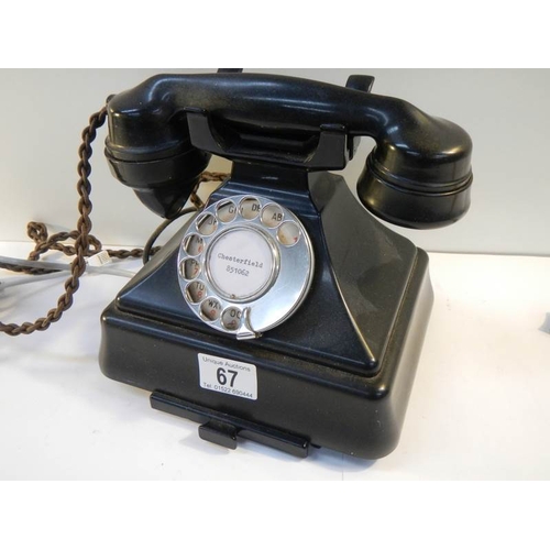 67 - A vintage black bakelite telephone converted for use.