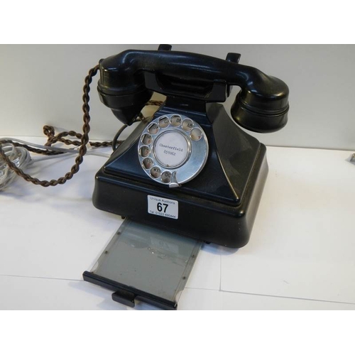 67 - A vintage black bakelite telephone converted for use.