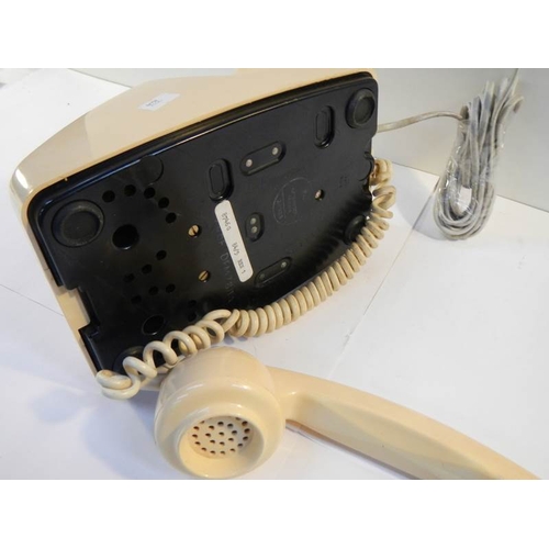 68 - An old cream telephone converted for use.