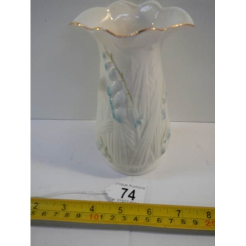 74 - An original Belleek vase, 6.5'' tall, in good condition.