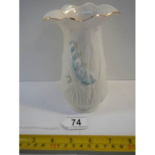 74 - An original Belleek vase, 6.5'' tall, in good condition.