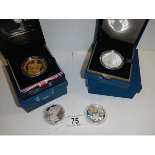 75 - A Canadian silver plated coin, An American silver dollar and 2 Diamond Jubilee silver anniversary co... 