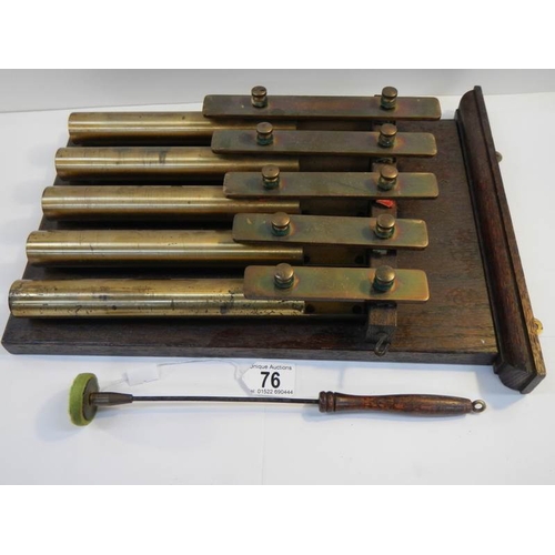 76 - An unusual brass 5 key xylophone with brass bell tubes, complete with hammer and in good working ord... 