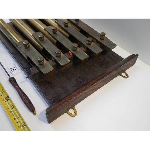 76 - An unusual brass 5 key xylophone with brass bell tubes, complete with hammer and in good working ord... 