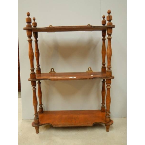 77 - A 3 shelf oak book rack with original turnings and finials, 29'' tall.