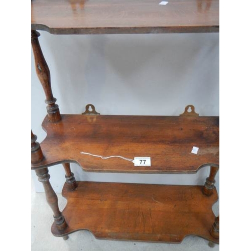 77 - A 3 shelf oak book rack with original turnings and finials, 29'' tall.