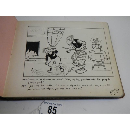 85 - An early 20th century autograph book with many drawings and watercolours.