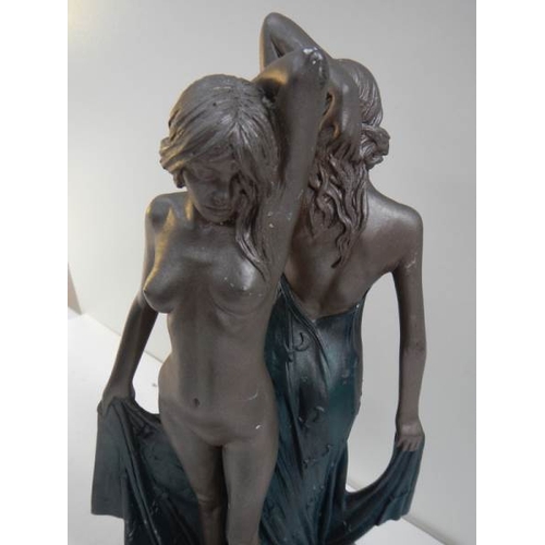 89 - An art deco style figure of a semi nude and a nude lady, 12.5'' tall.