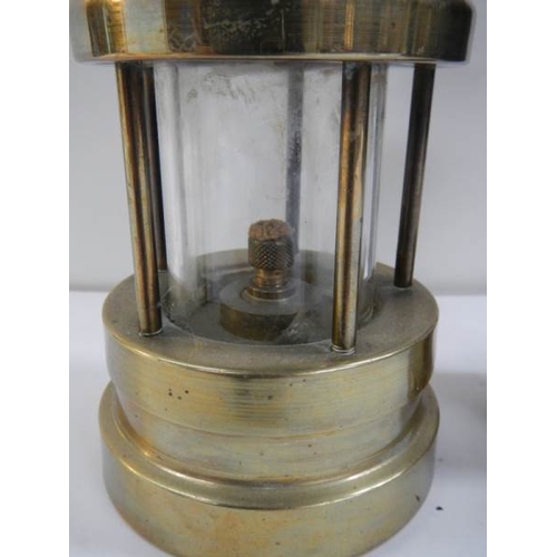 91 - 2 old miner's lamps, one brass and the other brass and steel marked W & P B 23573109