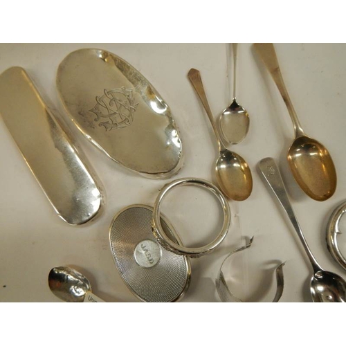 94 - A mixed lot of silver lids for glass bottles etc., silver spoons etc., 11 items in total weight 180g