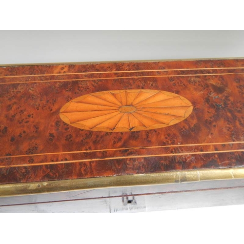 97 - An inlaid birds eye maple glove box.