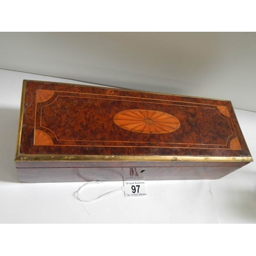 97 - An inlaid birds eye maple glove box.