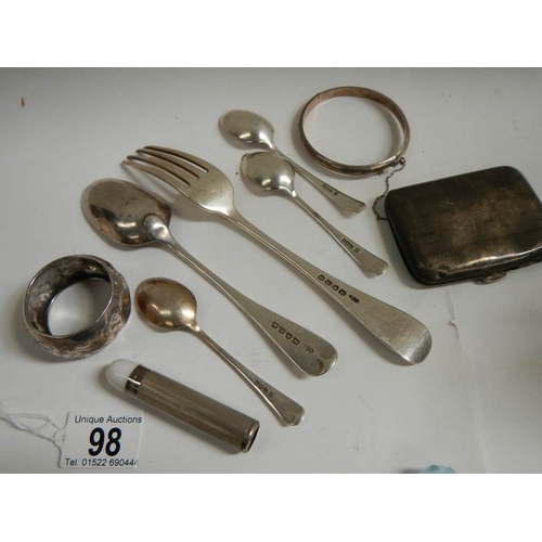 98 - A mixed lot of silver items including cigarette case, approximately 210 grams.