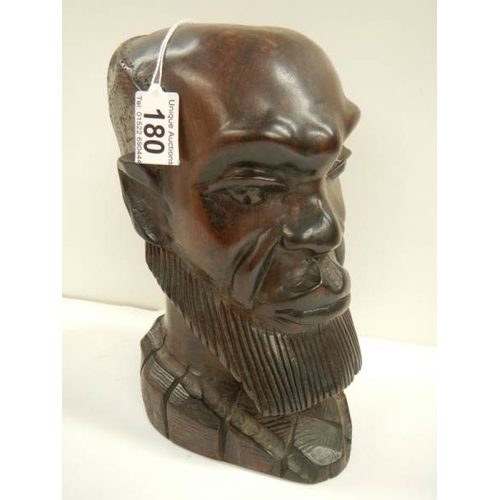 180 - A carved hardwood bust of a man in good condition, 10'' tall