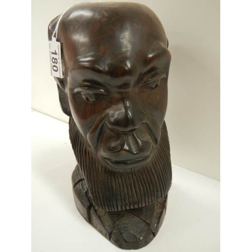 180 - A carved hardwood bust of a man in good condition, 10'' tall