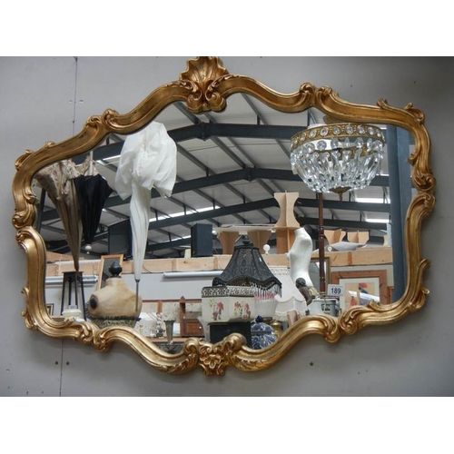 189 - A good oval gilt framed mirror, 41'' x 31''