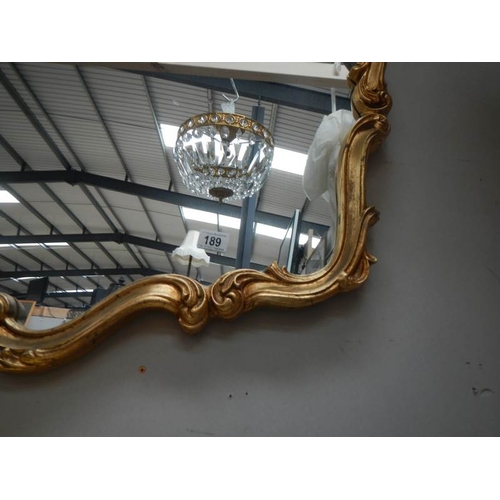 189 - A good oval gilt framed mirror, 41'' x 31''