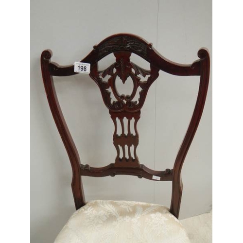 198 - An Edwardian bedroom chair on brass casters, in good condition,