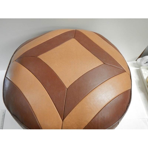 210 - A good vintage leather pouffe