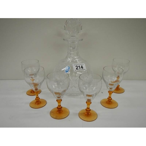 214 - A Royal Doulton crystal decanter and a set of 6 deco glasses with amber glass stems.