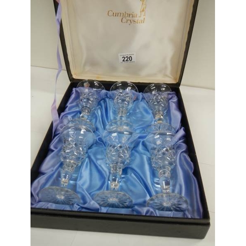 220 - A boxed set of 6 Cumbria crystal wine glasses, 5'' tall.