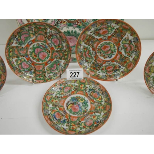 227 - 5 early Famille Rose saucers and a later famille rose plate.