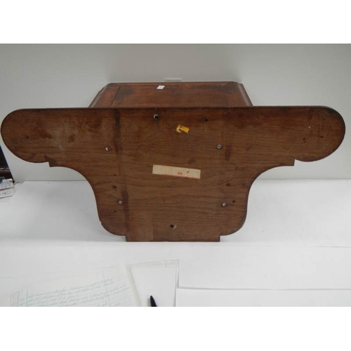 233 - A Victorian mahogany clock bracket, 23'' wide x 11.5'' high.