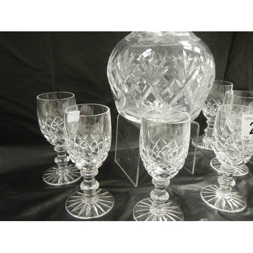 240 - A good decanter and 6 cut glass drinking glasses.