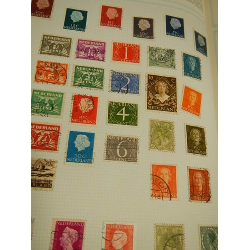 248 - A collection of postage stamps in 4 albums.