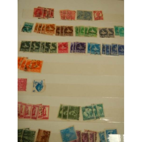 248 - A collection of postage stamps in 4 albums.