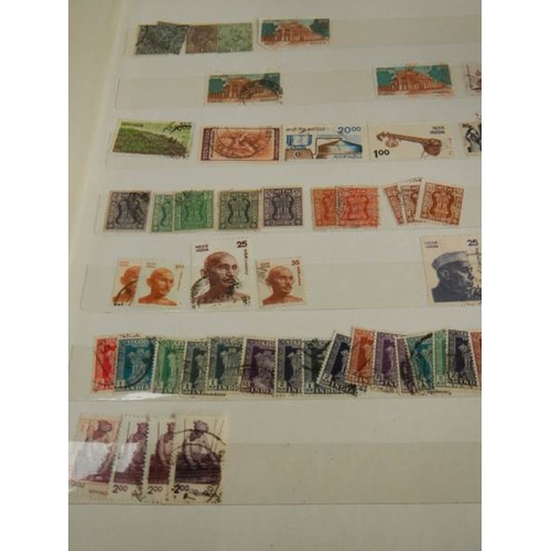 248 - A collection of postage stamps in 4 albums.