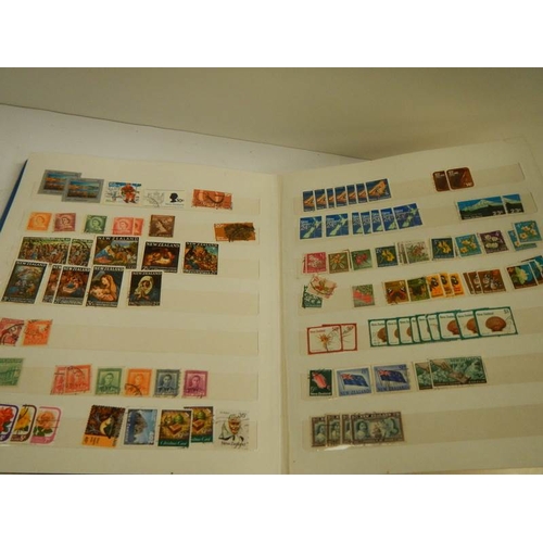 248 - A collection of postage stamps in 4 albums.