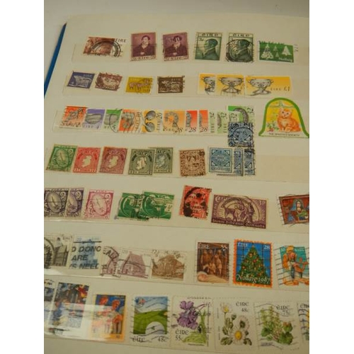 248 - A collection of postage stamps in 4 albums.