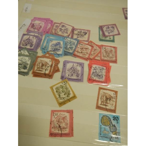 248 - A collection of postage stamps in 4 albums.