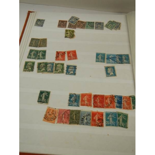 248 - A collection of postage stamps in 4 albums.