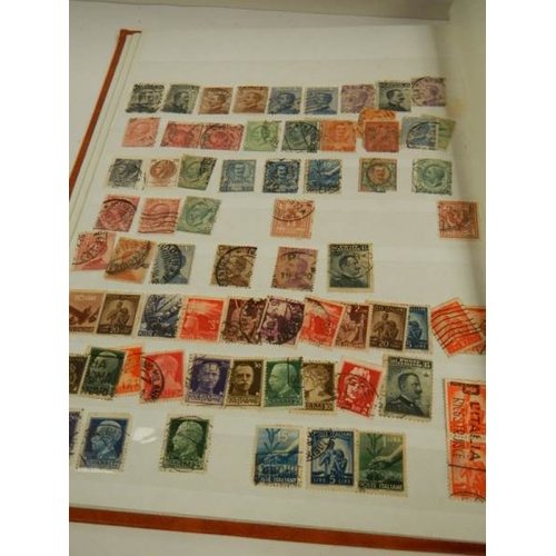 248 - A collection of postage stamps in 4 albums.