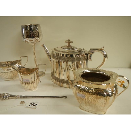 254 - 8 items of good 20th century silver plate and a silver handled button hook.