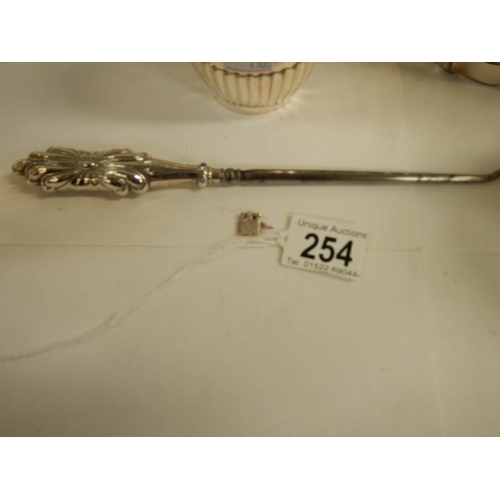 254 - 8 items of good 20th century silver plate and a silver handled button hook.