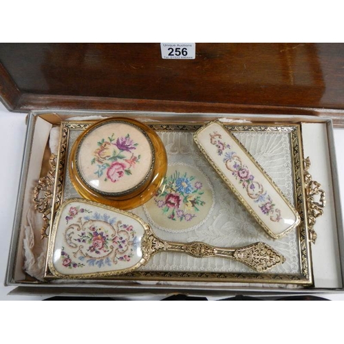 256 - An oak serving tray, a dressing table set (unused), and advertising brush and one other etc.,