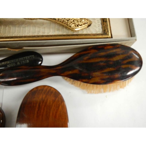 256 - An oak serving tray, a dressing table set (unused), and advertising brush and one other etc.,