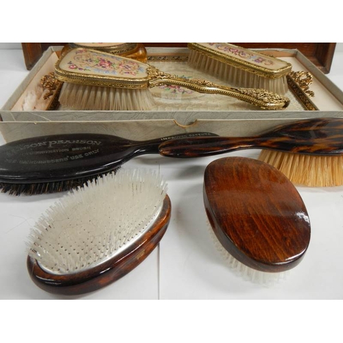 256 - An oak serving tray, a dressing table set (unused), and advertising brush and one other etc.,