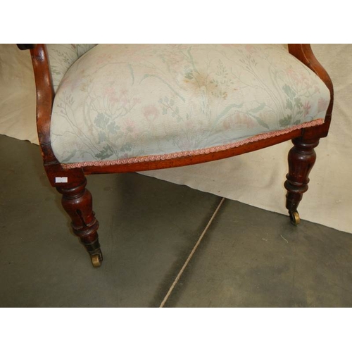 262 - A Victorian mahogany arm chair, upholstery in good condition for age.